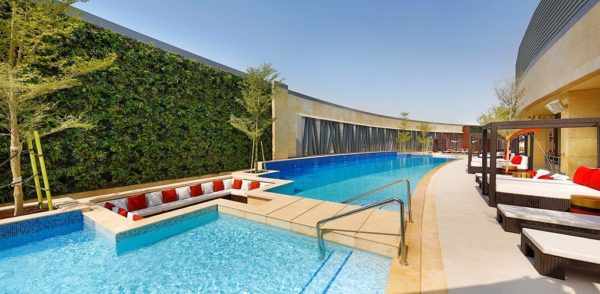 Hilton AlRayyan Hotel Doha Curio Collection pool area