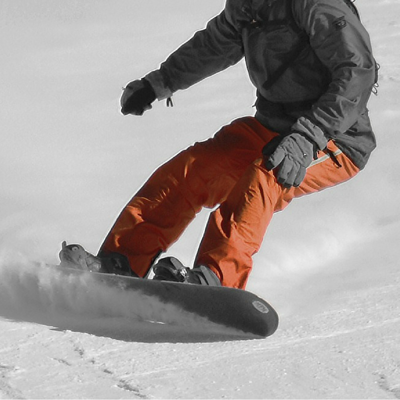 a person snowboarding down a slope
