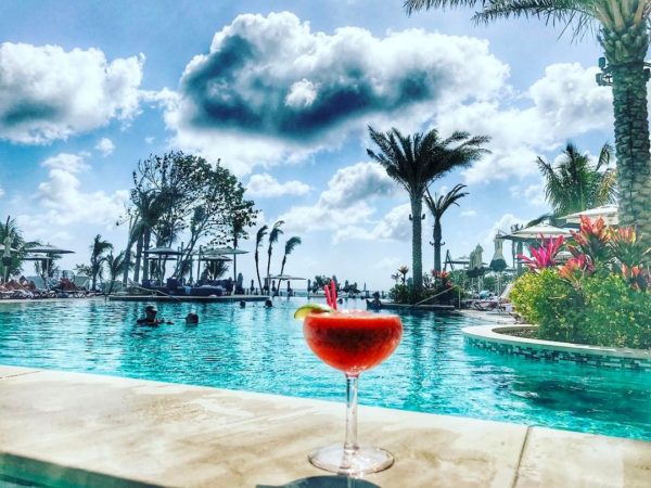 prepare your home before your next trip, Kimpton Seafire Resort pool and drinks
