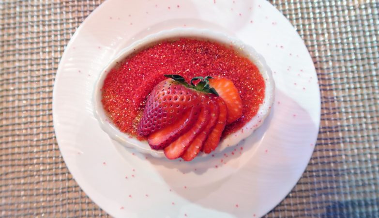 a plate of food with strawberries