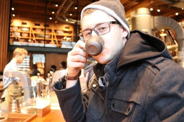 Tyler sipping coffee