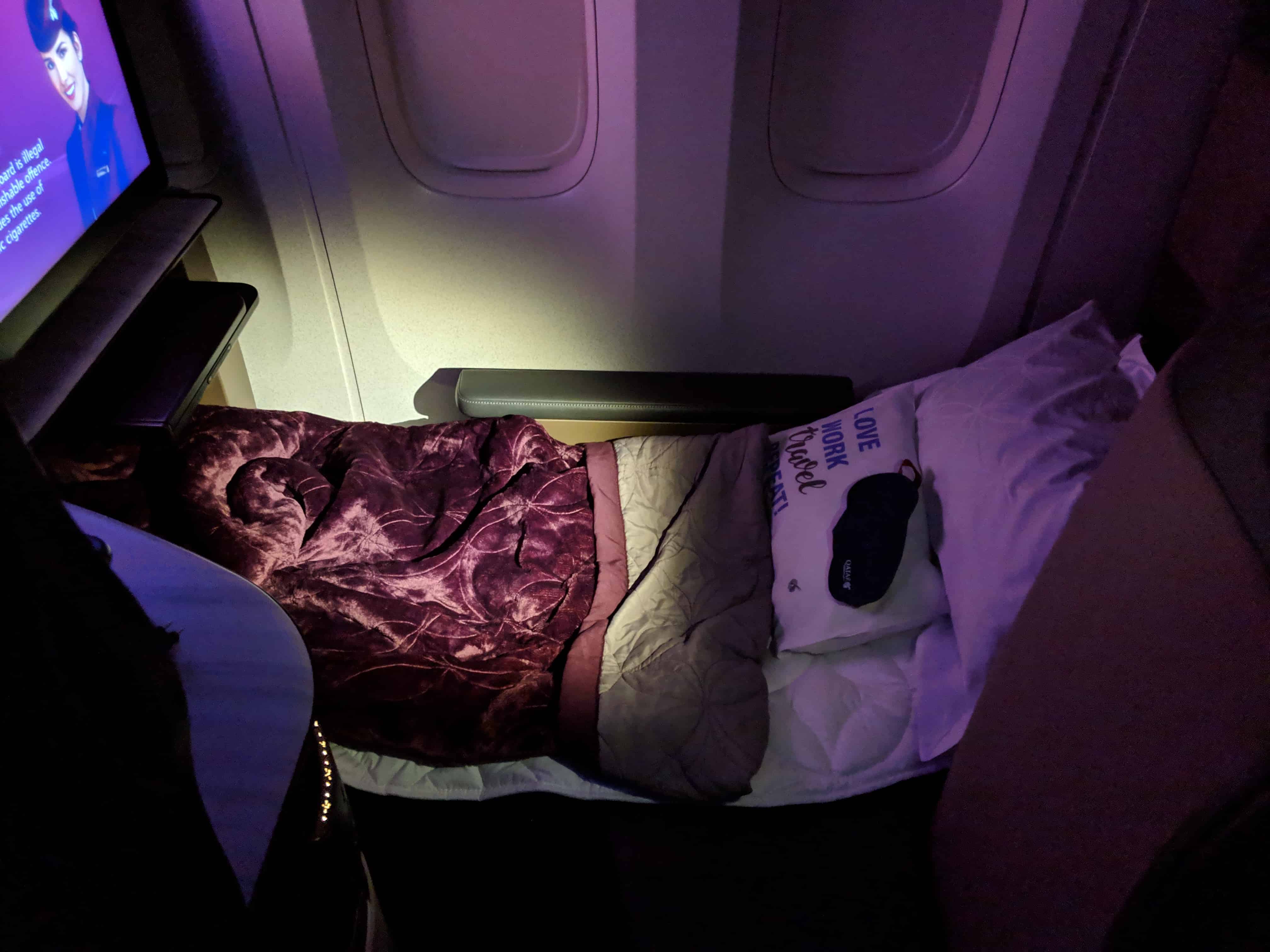 Qatar Qsuites review seat in bed mode
