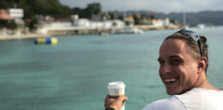 Martin Dasko Studenomics with coffee overlooking water