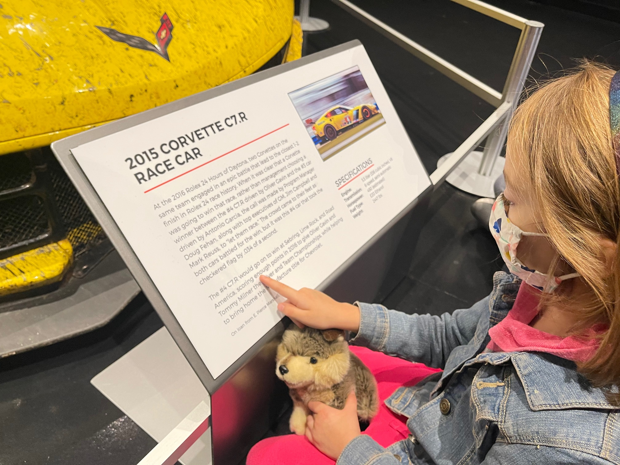 Best things to do in Bowling Green with kids. National Corvette Museum - Scarlett reading about 2015 Corvette C7R Race Car