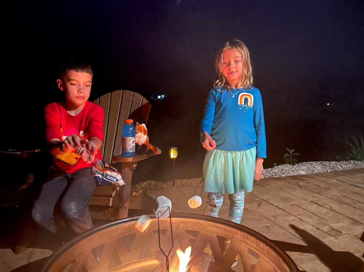 best things to do in Horse Cave Kentucky - Horse Cave KOA review 2021-07 Timothy and Scarlett roasting smores