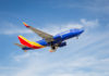 Southwest Airlines plane in sky 1200x800