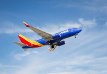 Southwest Airlines plane in sky 1200x800