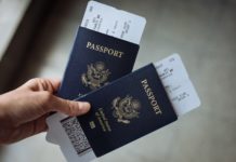 Passport and boarding pass by Global Residence Index on Unsplash