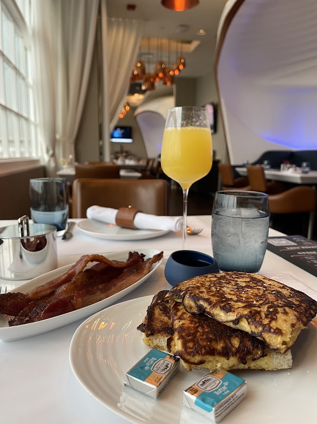 United CLASSIFIED at Newark French toast bacon and mimosa