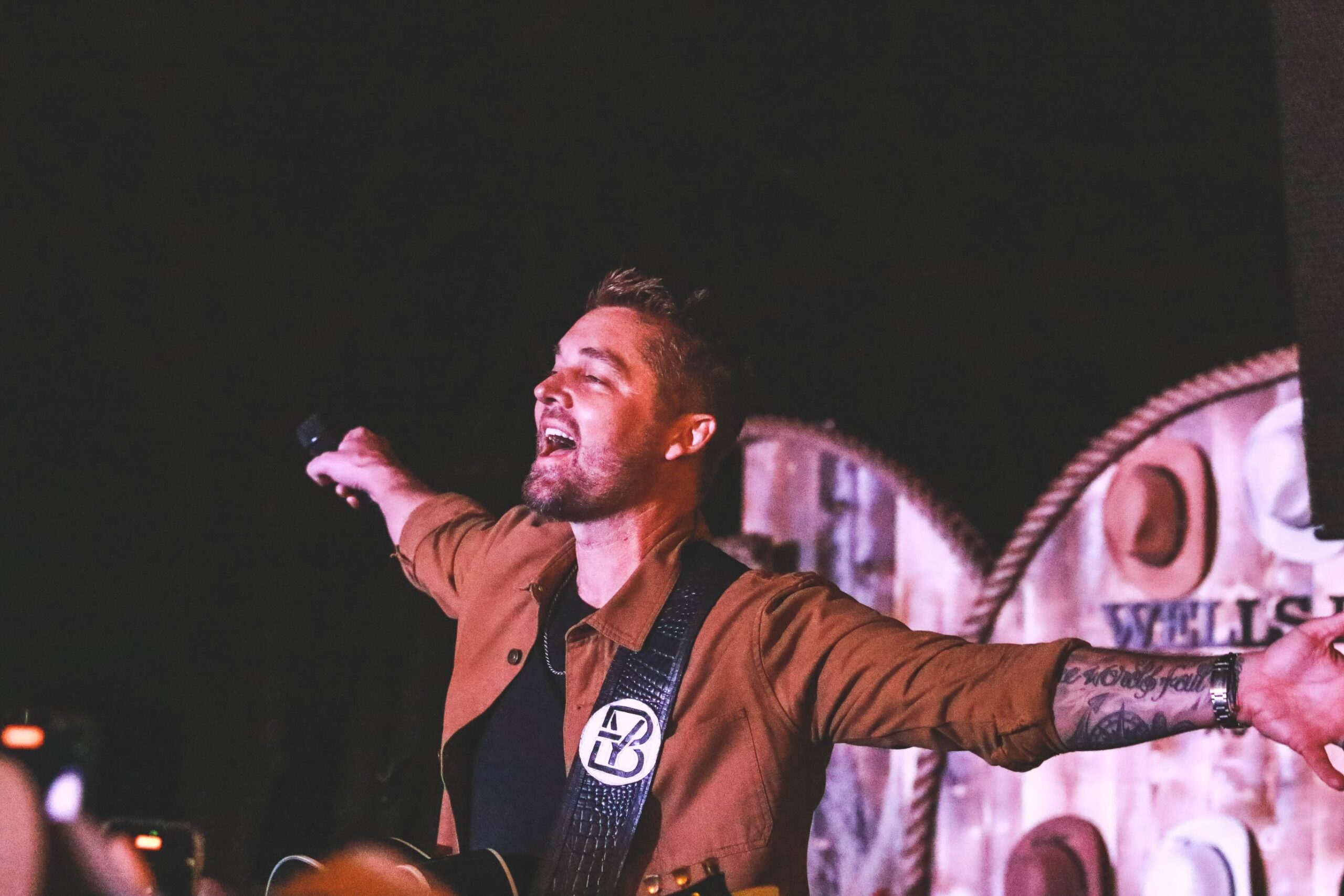 Brett Young performing at the Wells Fargo Opening Night event at CardCon November 2023