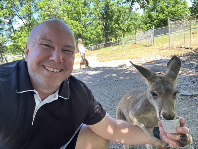 Feeding a kangaroo at Kentucky Down Under.