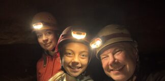 Hidden River Cave Off-Trail Tour Hidden River Cave off-trail tour hikers with headlamps